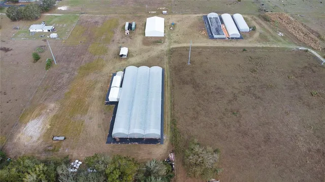 a view of a yard with furniture