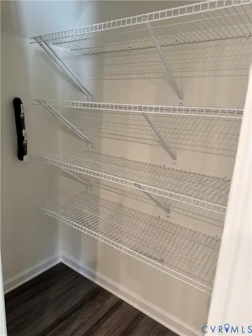 a bathroom with a shower and a sink