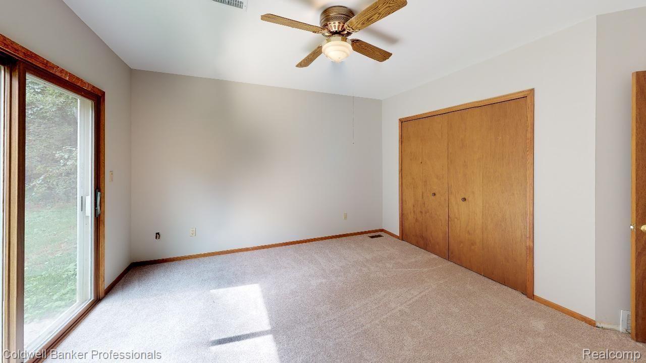 8611 Tindall Road Davisburg, MI 48350 - Photo 4 of 23 Entry Level Master Bedroom with Door Wall to Outside