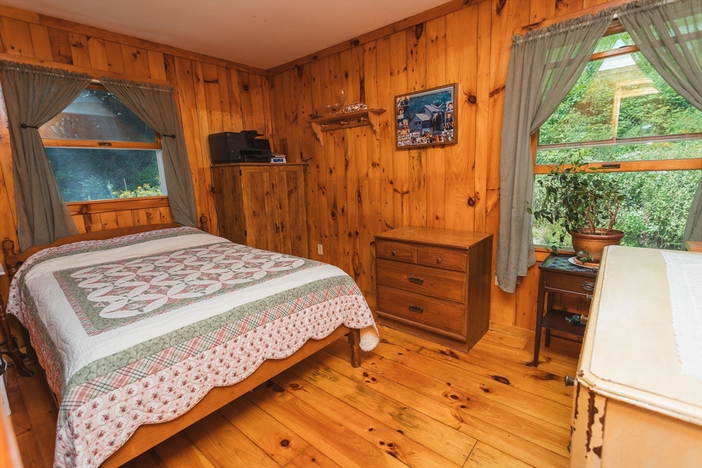 90 West Hawley Road Hawley, MA 01339 - Photo 17 of 34 a bedroom with a bed and a dresser