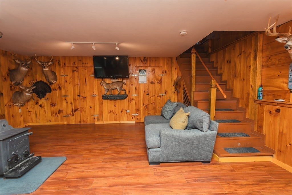 90 West Hawley Road Hawley, MA 01339 - Photo 21 of 34 a living room with furniture and a rug