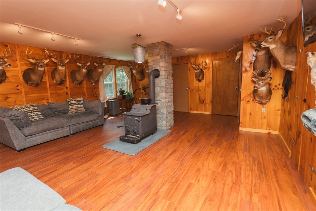90 West Hawley Road Hawley, MA 01339 - Photo 22 of 34 a living room with furniture and wooden floor