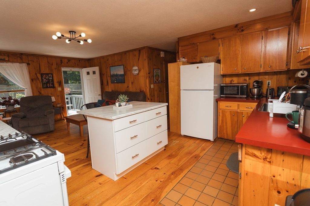 90 West Hawley Road Hawley, MA 01339 - Photo 6 of 34 a kitchen with a refrigerator and a stove