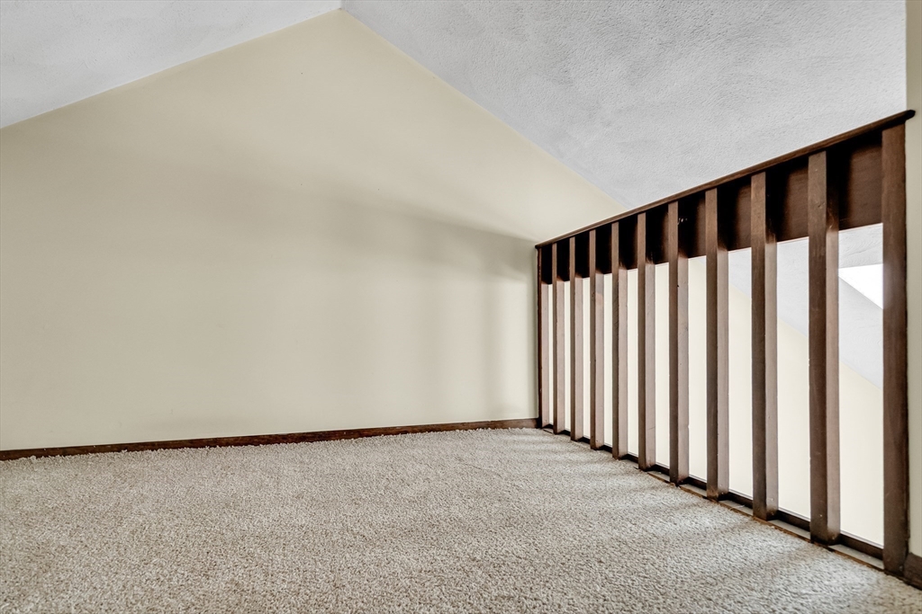 58 MacIntosh Lane, Unit 58 Boxborough, MA 01719 - Photo 21 of 23 a view of an empty room