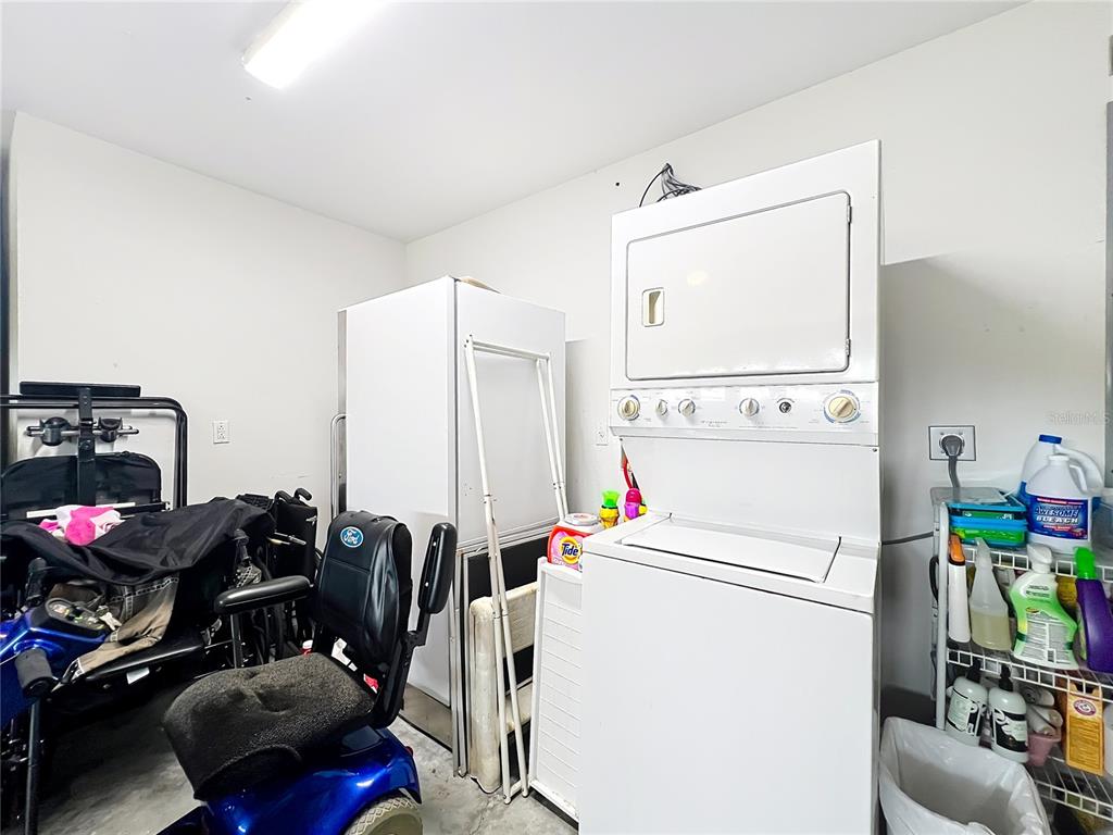 22163 Southwest Edgewater Boulevard Dunnellon, FL 34431 - Photo 55 of 78 a utility room with dryer and washer