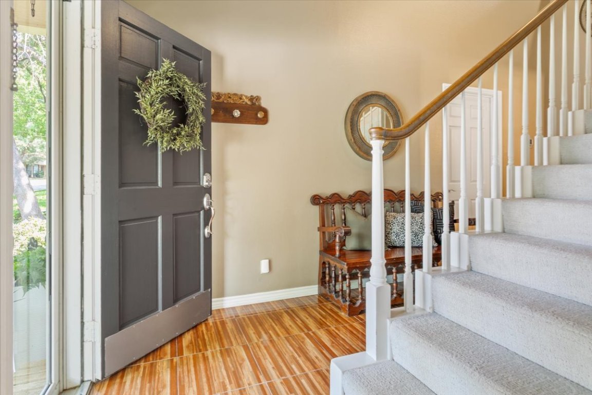 2217 Stagecoach Trail Temple, TX 76502 - Photo 8 of 39 a view of entryway with wooden floor and stairs