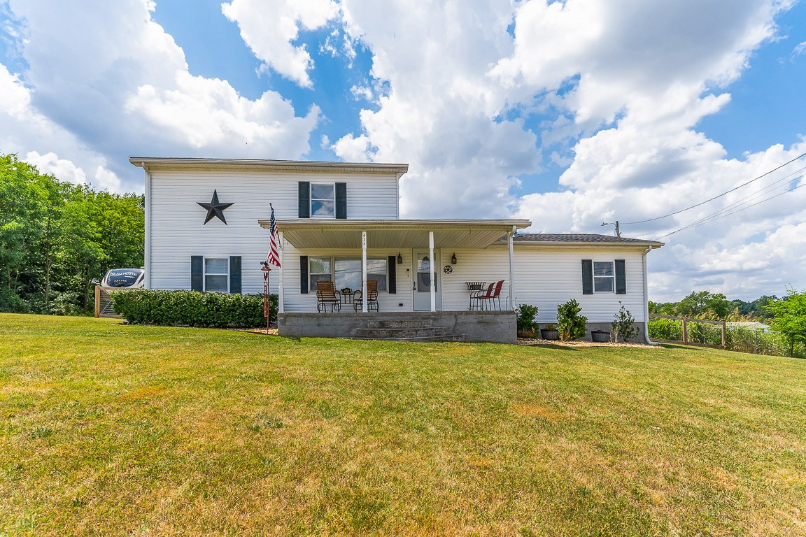 425 Keysburg Road Adams, TN 37010 - Photo 1 of 45 a front view of house with yard and entertaining space