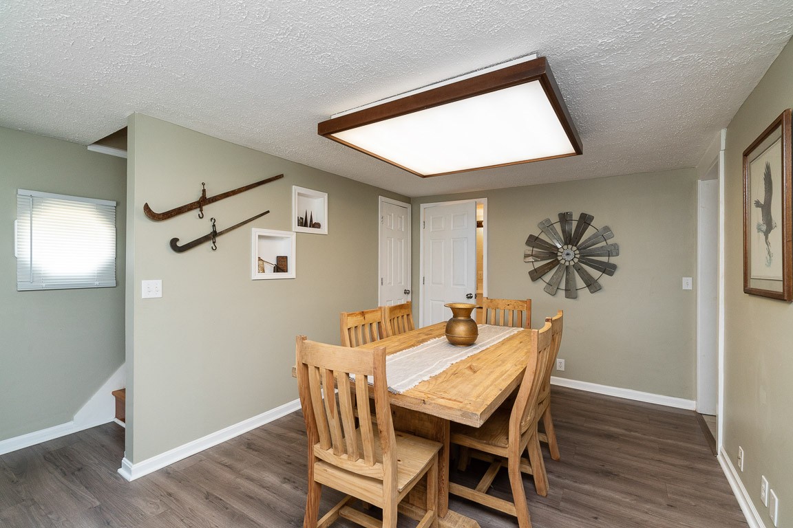 425 Keysburg Road Adams, TN 37010 - Photo 11 of 45 a view of a dining room with furniture and wooden floor