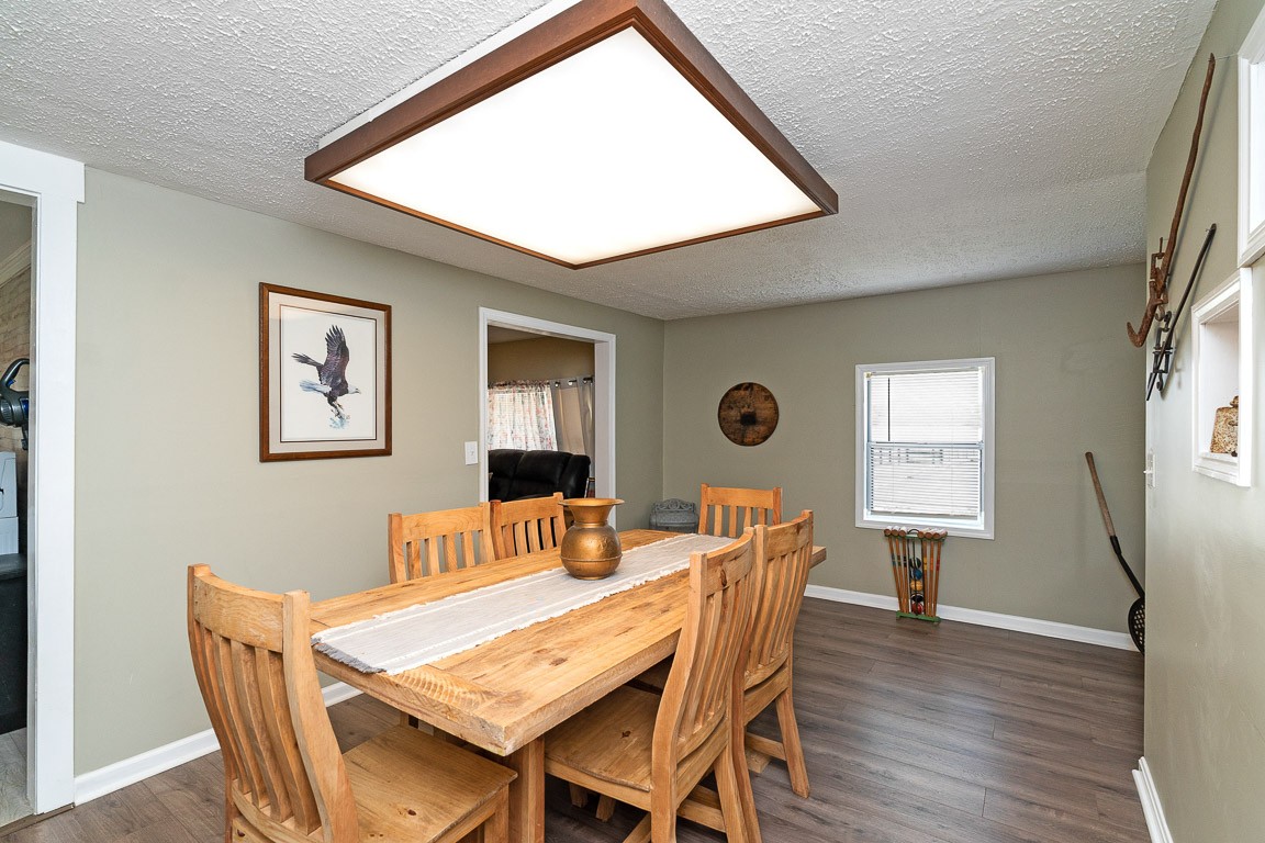 425 Keysburg Road Adams, TN 37010 - Photo 13 of 45 a view of a dining room with furniture window and wooden floor