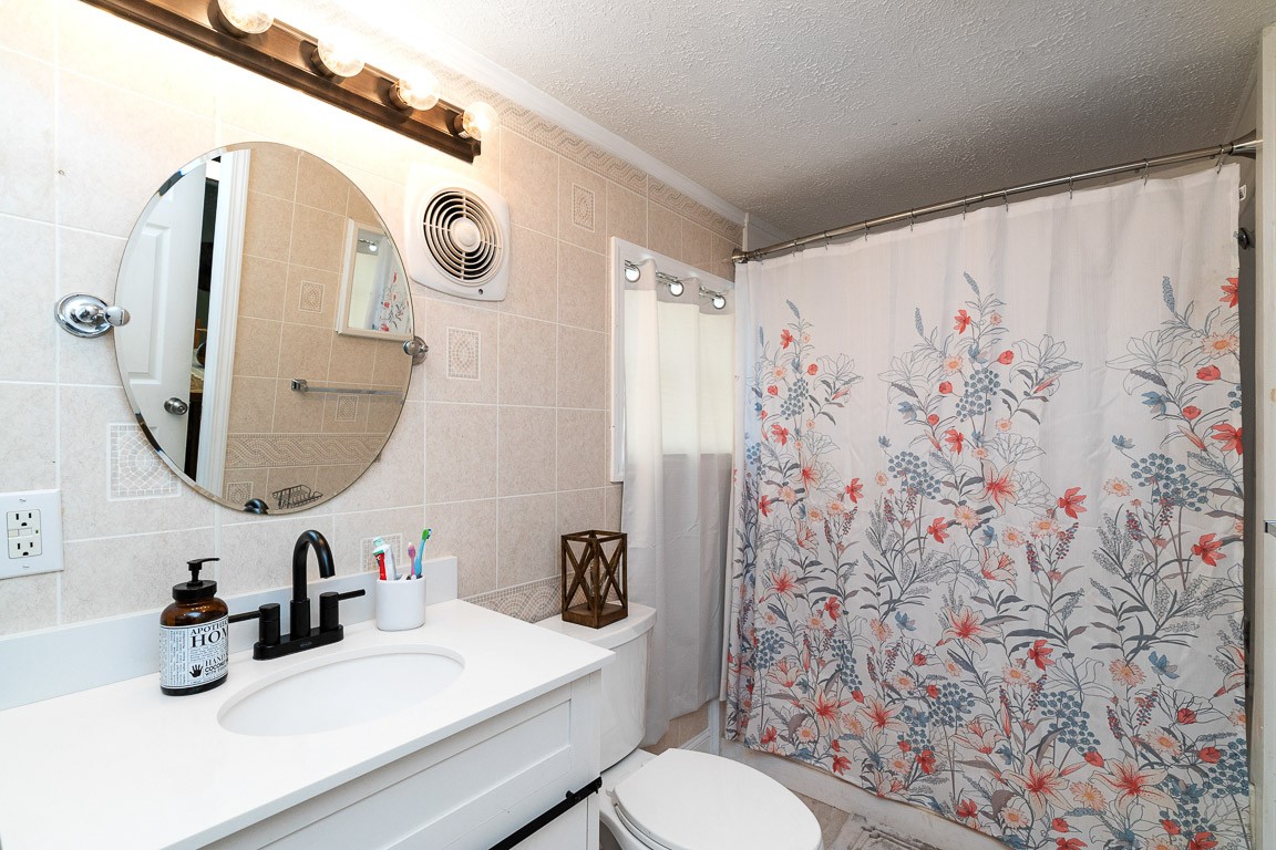 425 Keysburg Road Adams, TN 37010 - Photo 22 of 45 a bathroom with a sink and a mirror