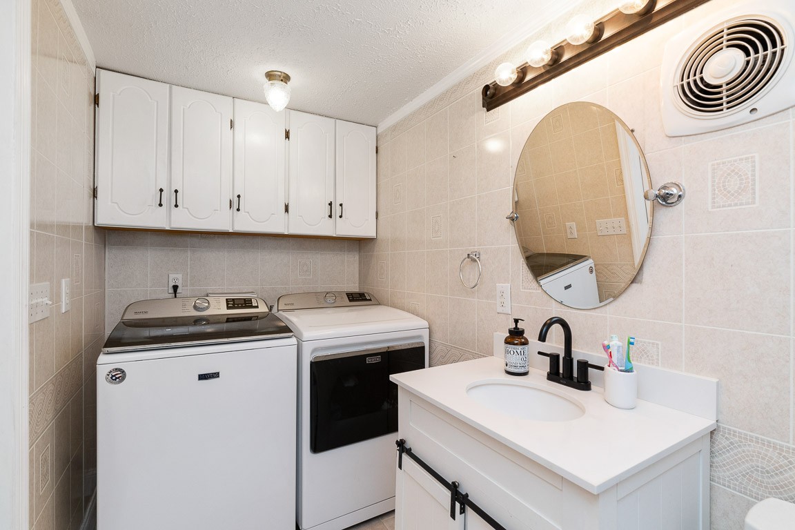 425 Keysburg Road Adams, TN 37010 - Photo 23 of 45 a kitchen with a sink a stove and cabinets