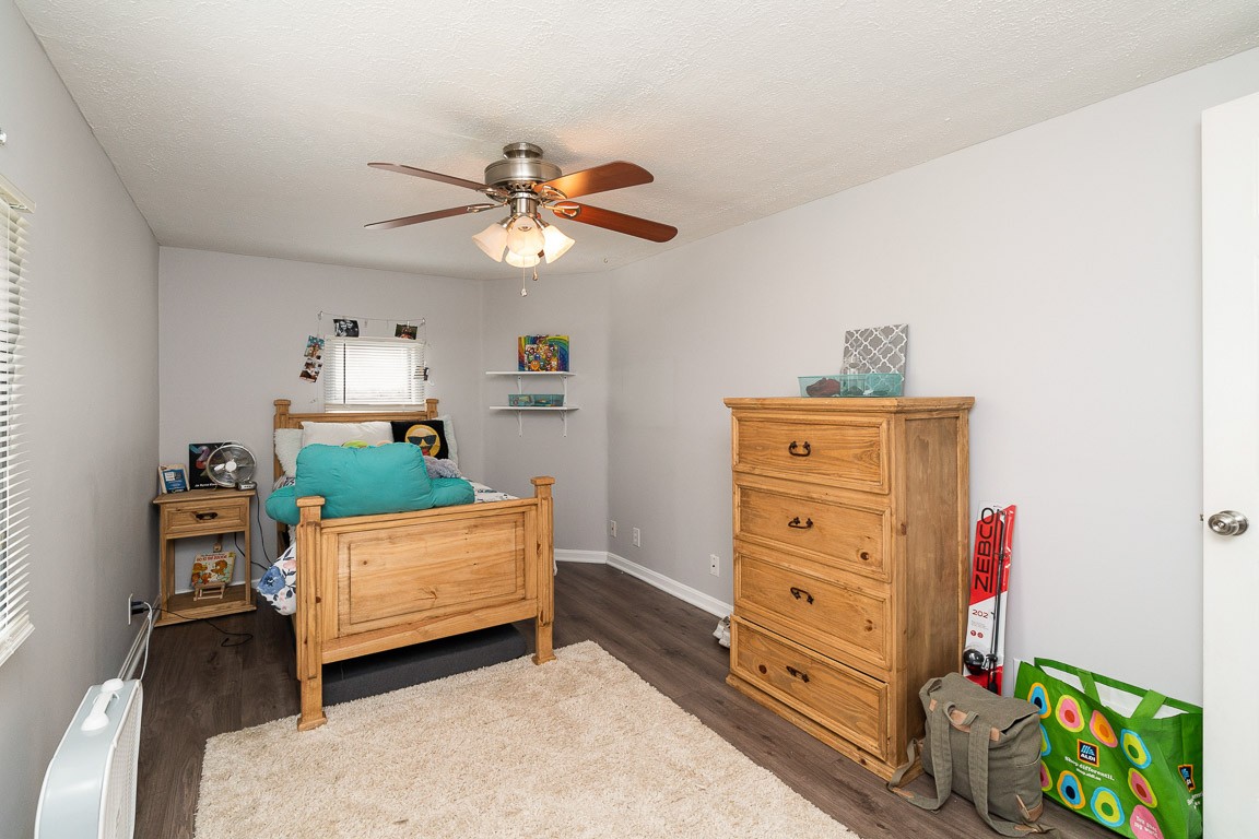 425 Keysburg Road Adams, TN 37010 - Photo 32 of 45 a bedroom with a bed and a dresser in it