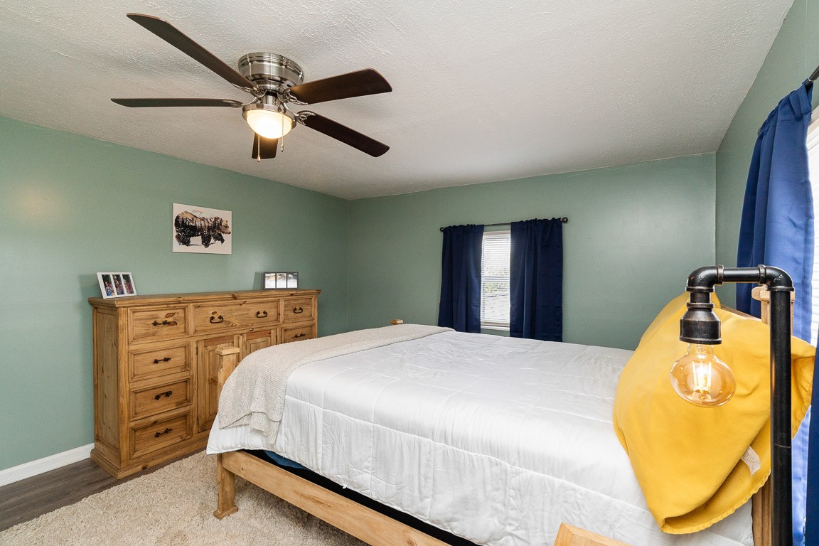 425 Keysburg Road Adams, TN 37010 - Photo 35 of 45 a bedroom with a bed and a mirror
