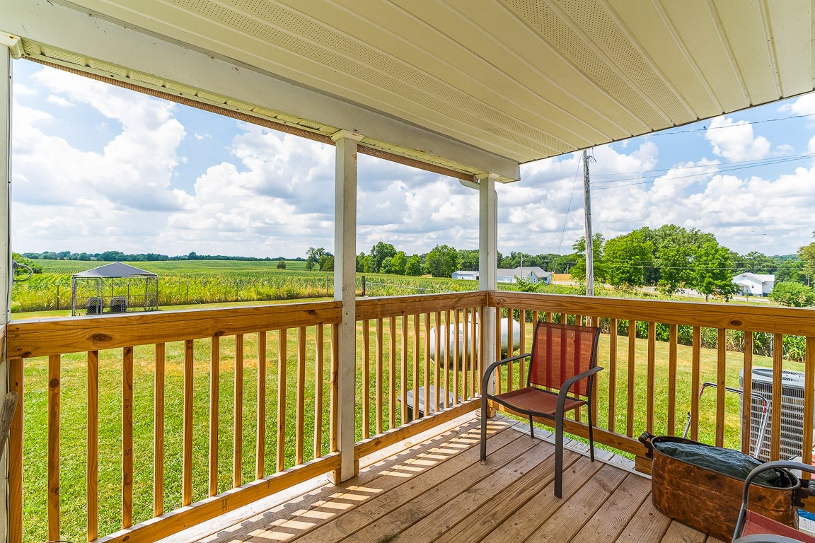 425 Keysburg Road Adams, TN 37010 - Photo 39 of 45 a view of a two chair in the balcony