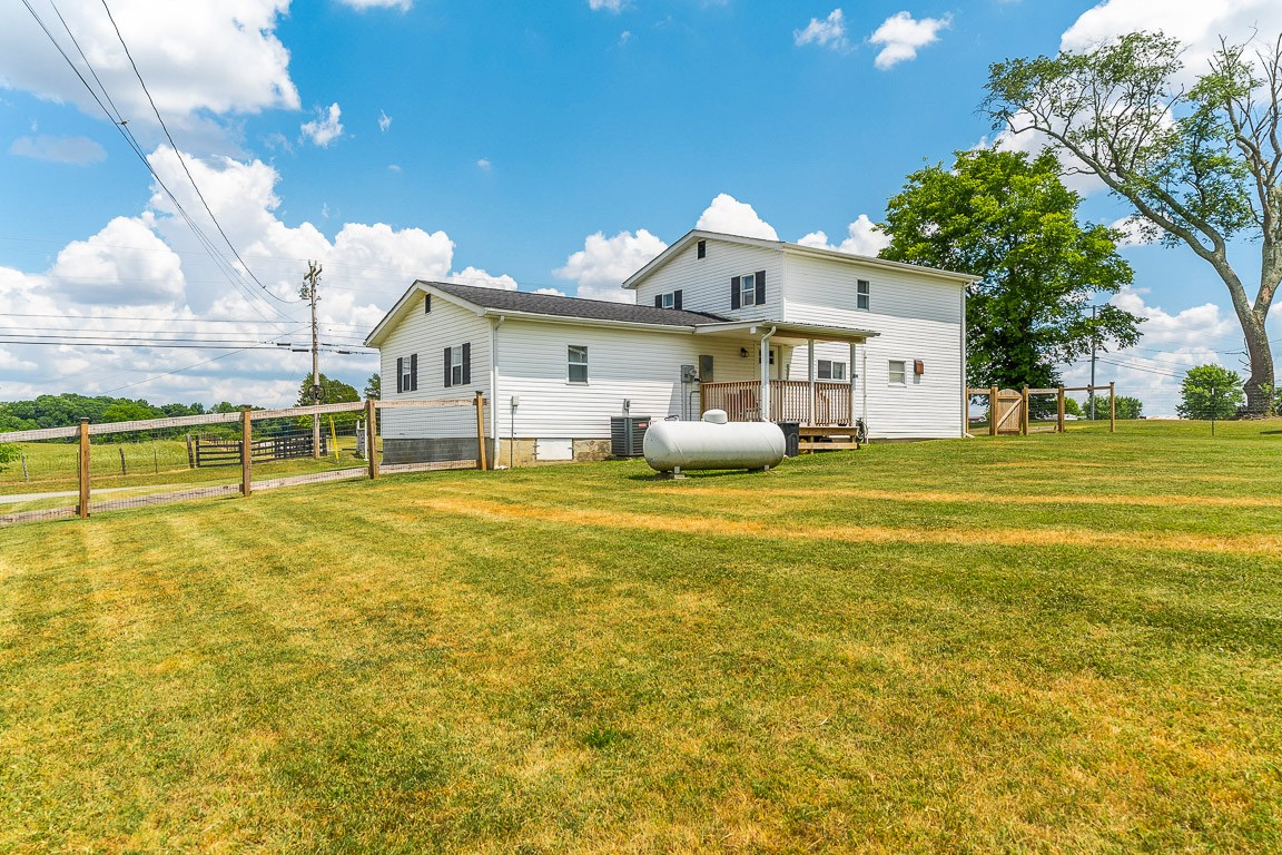 425 Keysburg Road Adams, TN 37010 - Photo 41 of 45 a view of a house with a swimming pool
