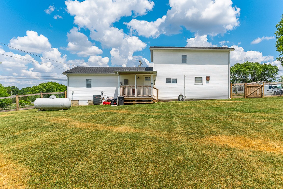 425 Keysburg Road Adams, TN 37010 - Photo 42 of 45 a house view with swimming pool and yard