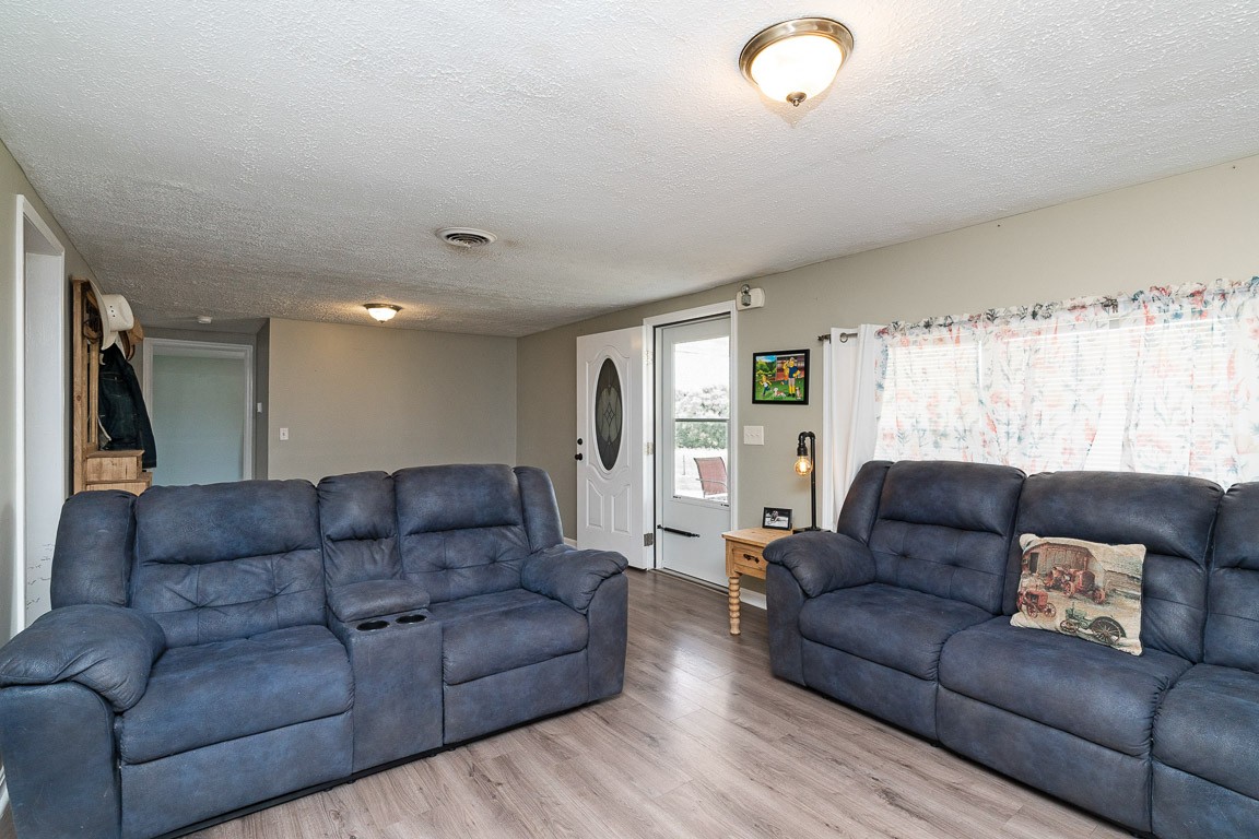 425 Keysburg Road Adams, TN 37010 - Photo 7 of 45 a living room with furniture window and a couch