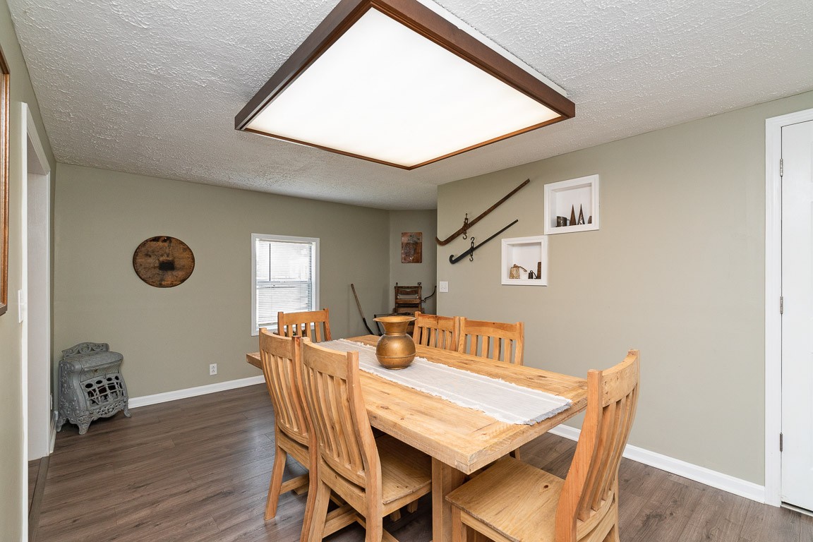 425 Keysburg Road Adams, TN 37010 - Photo 10 of 45 a dining room with furniture and wooden floor