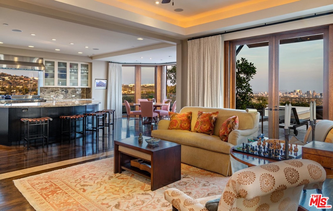 1870 Mango Way Los Angeles, CA 90049 - Photo 12 of 28 a living room with furniture and a table