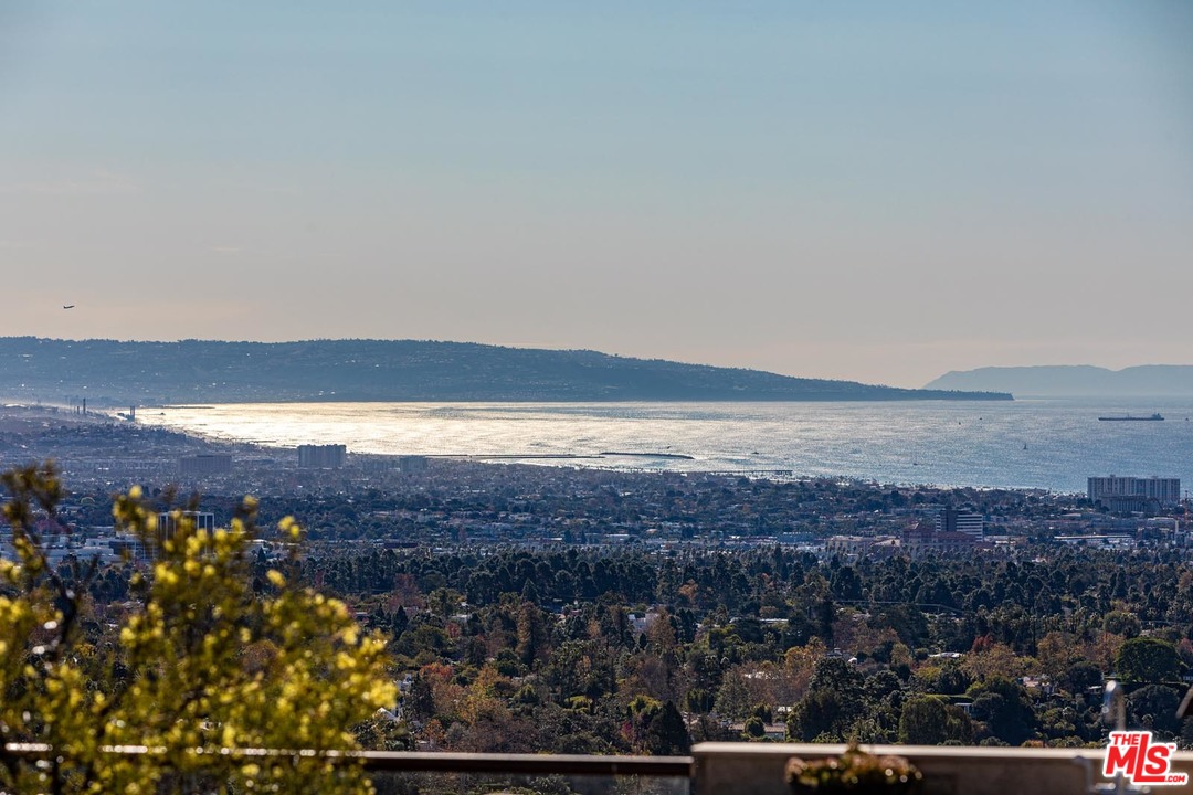 1870 Mango Way Los Angeles, CA 90049 - Photo 6 of 28 an aerial view of residential building and ocean