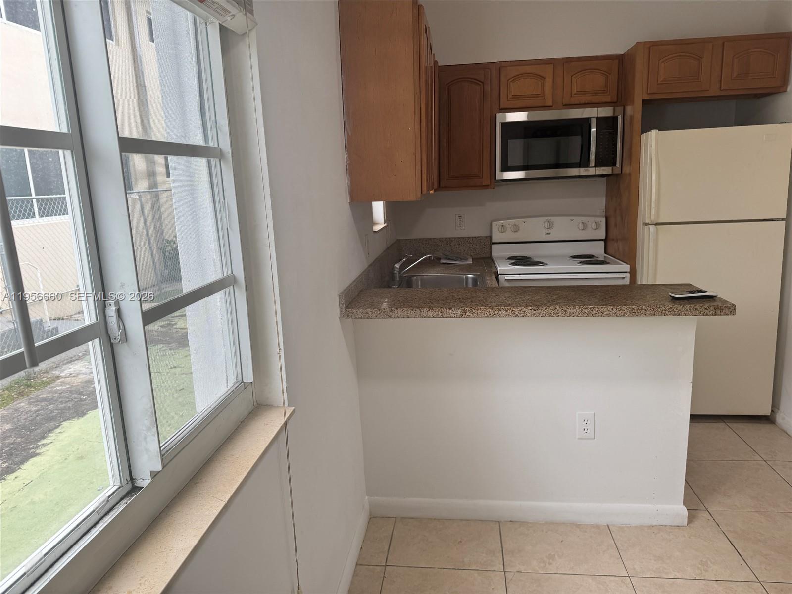 7130 Rue Versailles Drive, Unit 4 Miami Beach, FL 33141 - Photo 8 of 12