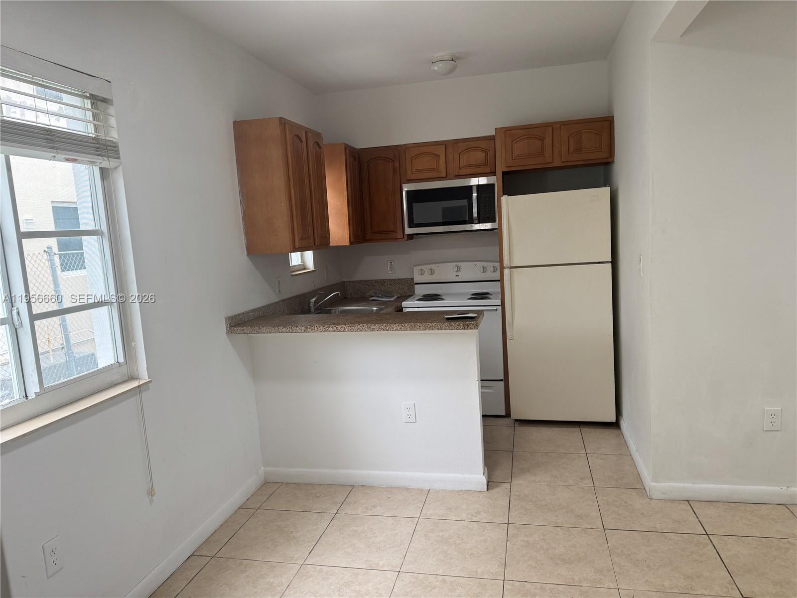 7130 Rue Versailles Drive, Unit 4 Miami Beach, FL 33141 - Photo 9 of 12