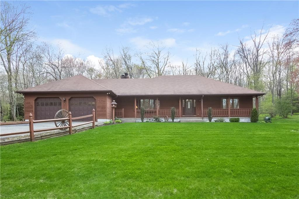 167 County Line Road Torrington, CT 06790 - Photo 1 of 1 a front view of a house with garden
