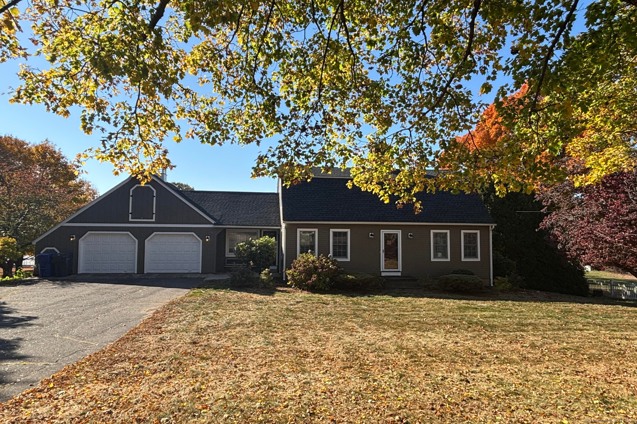 1241 Halladay Avenue West Suffield, CT 06078 - Photo 2 of 29 a front view of a house with a garden