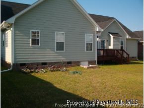 3533 Talus Road Fayetteville, NC 28306 - Photo 3 of 7 a front view of a house with yard