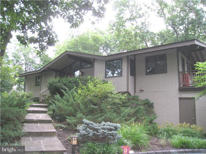 1501 Gypsy Hill Road Lower Gwynedd, PA 19002 - Photo 1 of 24 a front view of house with yard and trees