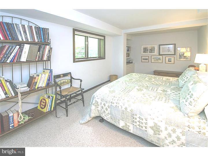 1501 Gypsy Hill Road Lower Gwynedd, PA 19002 - Photo 15 of 24 a bedroom with a bed dresser and a window