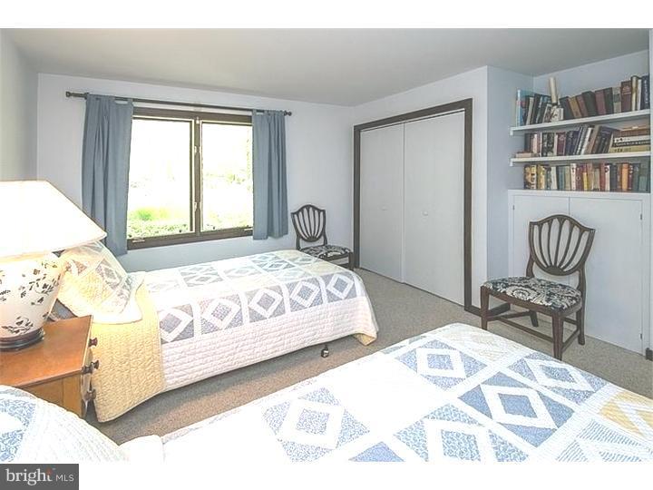 1501 Gypsy Hill Road Lower Gwynedd, PA 19002 - Photo 17 of 24 a bedroom with a bed and a window
