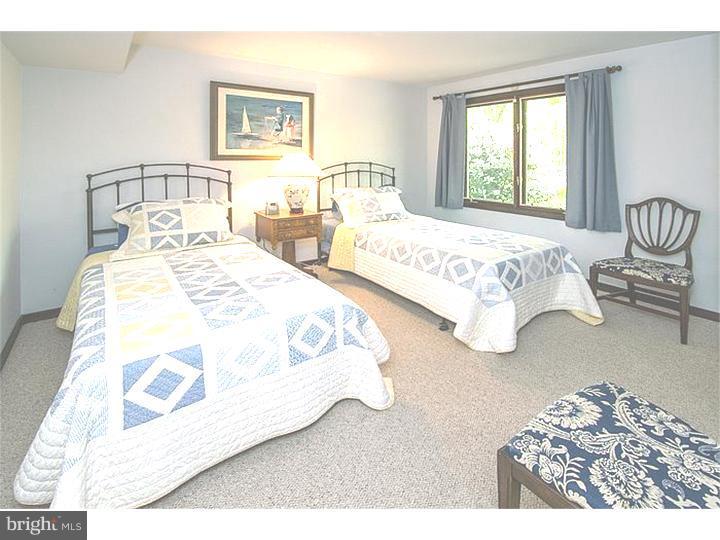 1501 Gypsy Hill Road Lower Gwynedd, PA 19002 - Photo 18 of 24 a bedroom with a bed and wooden floor