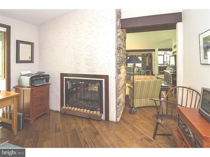 1501 Gypsy Hill Road Lower Gwynedd, PA 19002 - Photo 8 of 24 a living room with furniture and a fireplace