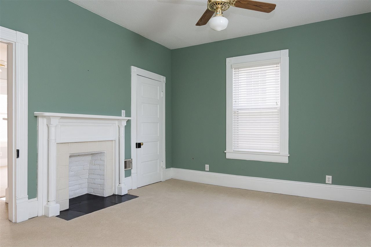 316 North Boundary Street Raleigh, NC 27604 - Photo 18 of 23 an empty room with a empty space and windows