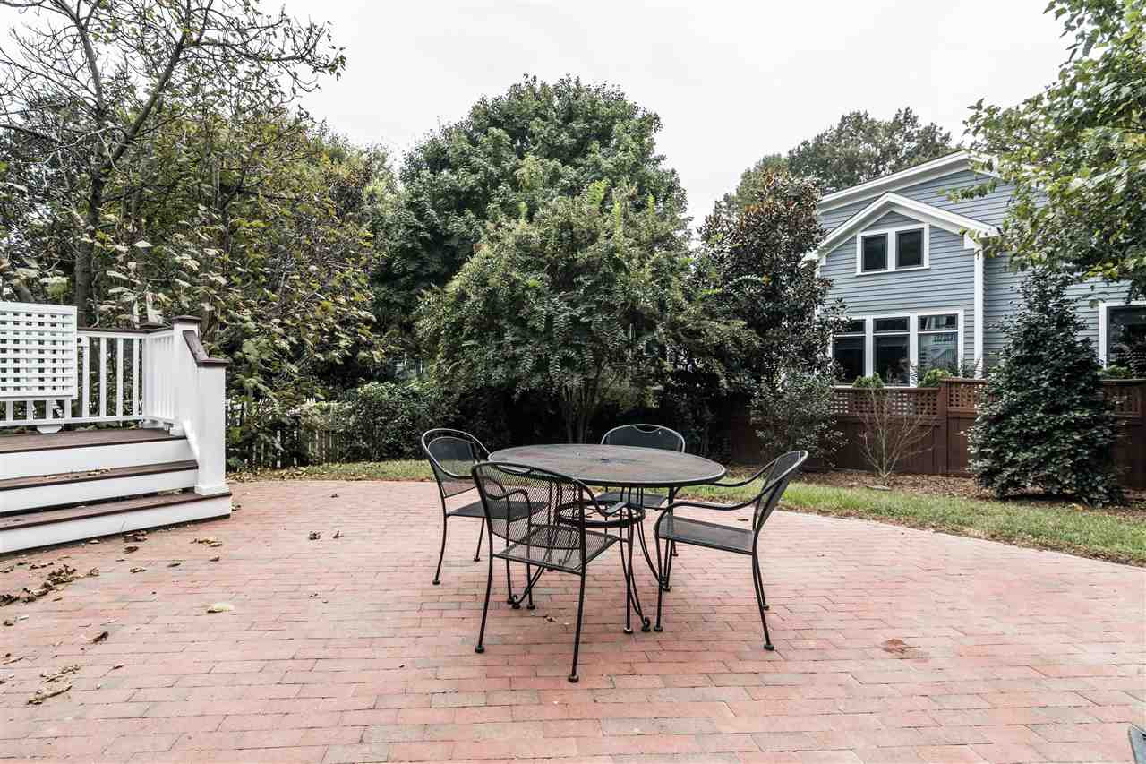 316 North Boundary Street Raleigh, NC 27604 - Photo 23 of 23 a backyard of a house with table and chairs