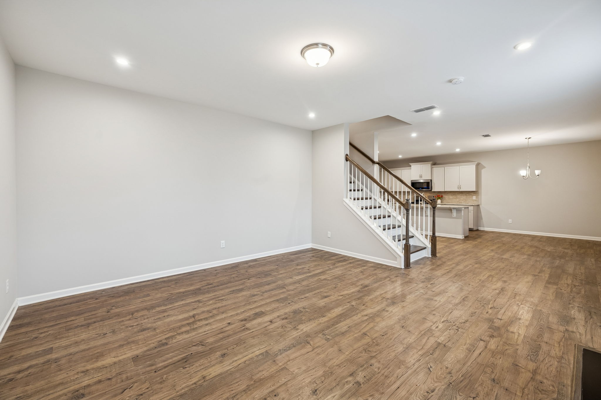 3611 Willow Bay Lane Murfreesboro, TN 37128 - Photo 16 of 46 a view of an empty room with wooden floor
