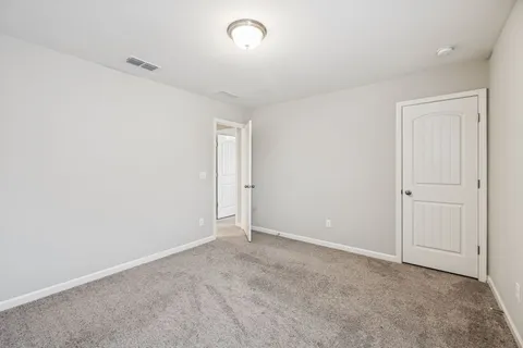 an empty room with an entryway