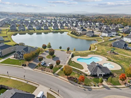 a childrens park with lots of swings and slides