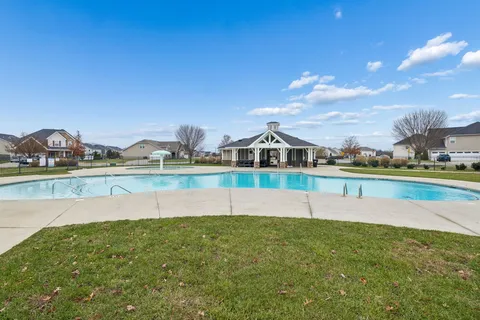 an aerial view of a swimming pool