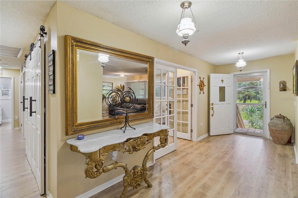 4191 Corey Road Malabar, FL 32950 - Photo 11 of 53 a view of a livingroom with furniture and hardwood floor