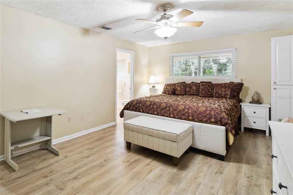 4191 Corey Road Malabar, FL 32950 - Photo 18 of 53 a bedroom with a bed and a window