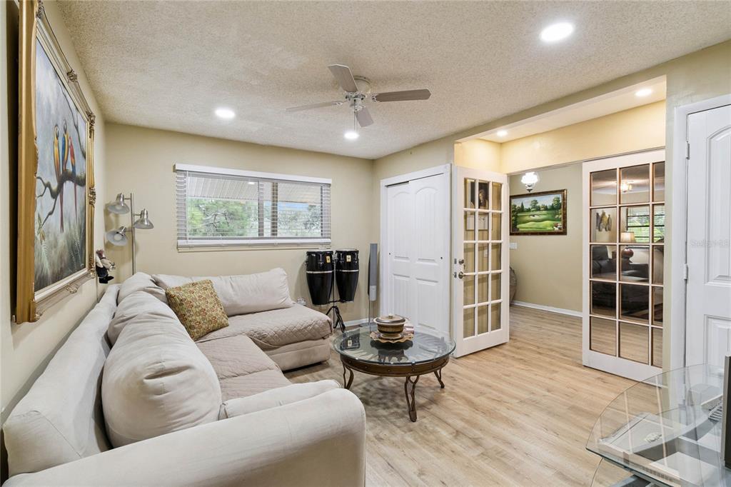 4191 Corey Road Malabar, FL 32950 - Photo 22 of 53 a living room with furniture and a window