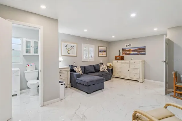 a view of a park with large trees