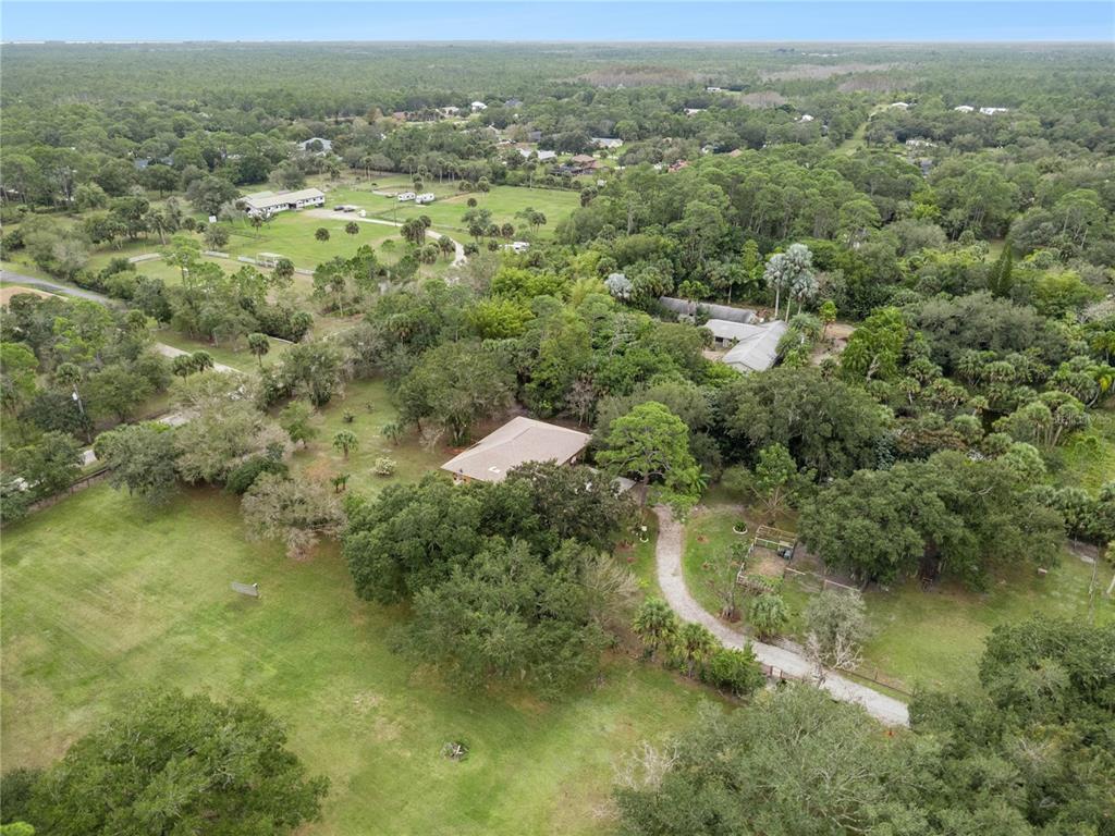 4191 Corey Road Malabar, FL 32950 - Photo 51 of 53 a view of a forest with a lake
