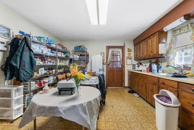 a bed room with a bed and a window