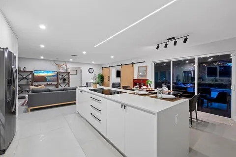 a kitchen with stainless steel appliances lots of counter top space