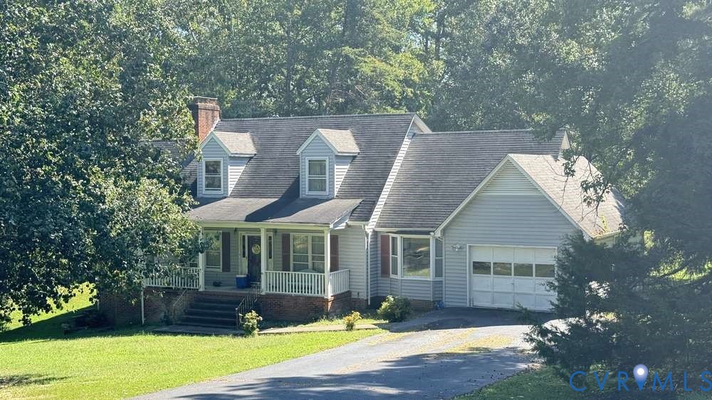 320 Wilson Road Danville, VA 24541 - Photo 1 of 17 Light blue siding exterior with a dark shingle roo