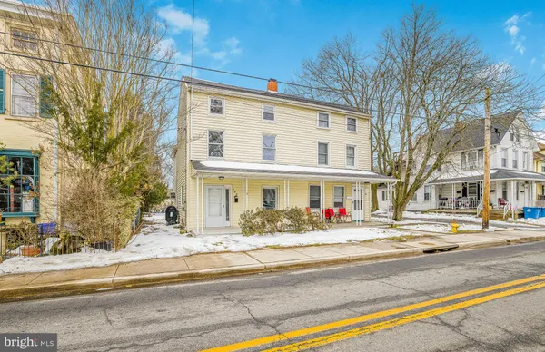 a front view of a building with street