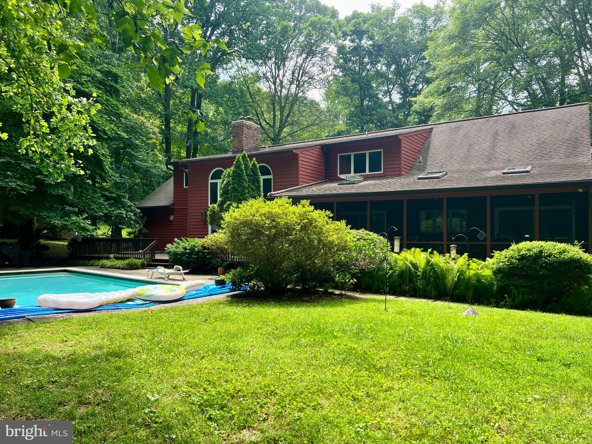 1109 Timber Trail Road Towson, MD 21286 - Photo 2 of 3 Serene retreat with poolside charm.